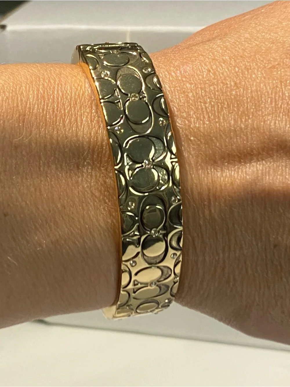 Gold-toned Coach Bangle